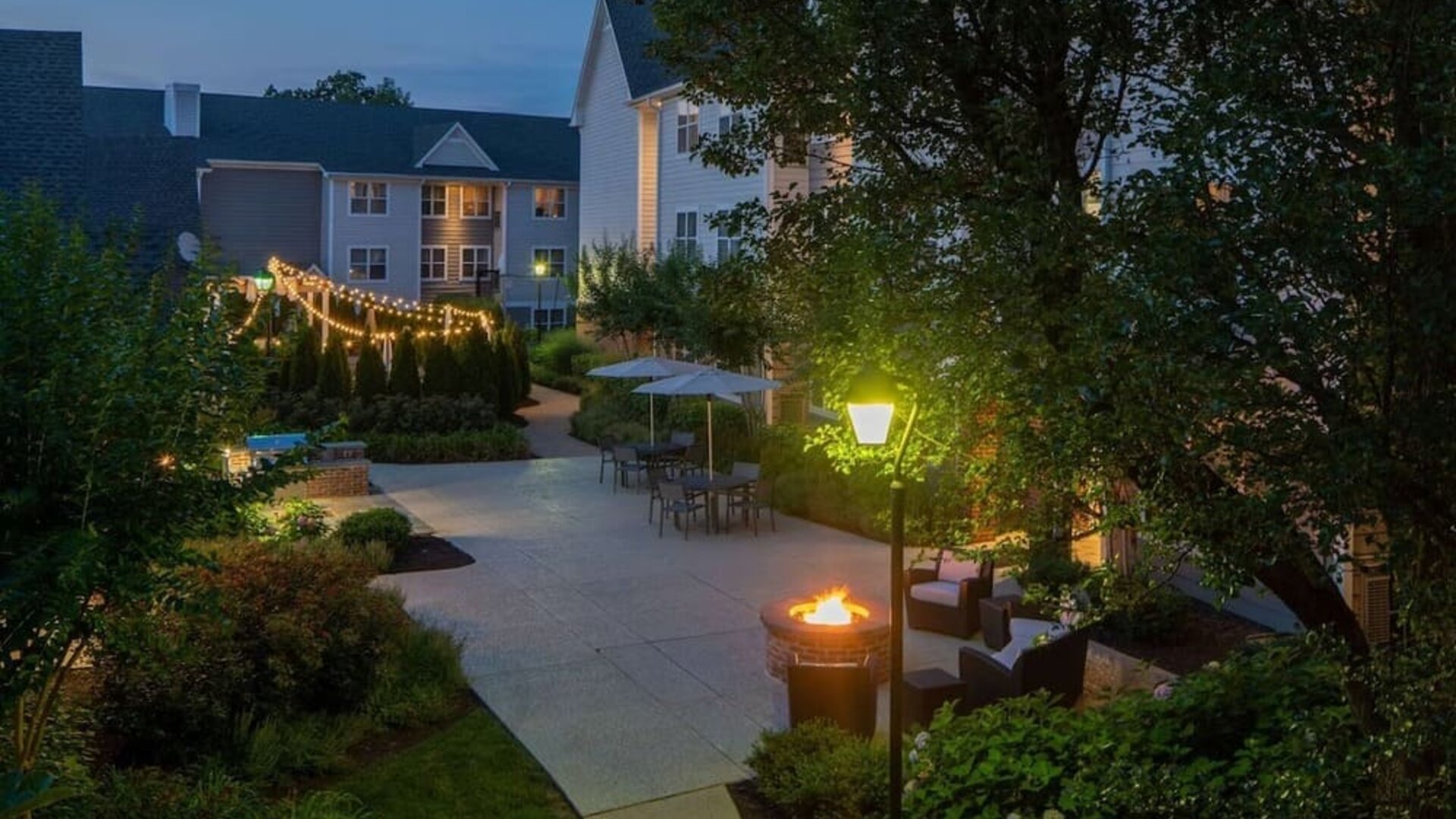 Hotel terrace with lounge seating at Sonesta ES Suites Fairfax Fair Lakes.