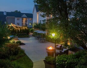 Hotel terrace with lounge seating at Sonesta ES Suites Fairfax Fair Lakes.