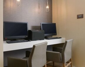 Business center with comfortable seating and printer at Sonesta ES Suites Fort Worth Fossil Creek.