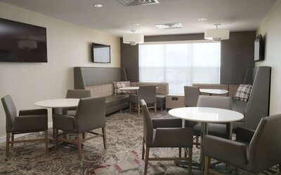 Dining area at Sonesta ES Suites Fort Worth Fossil Creek.
