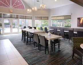 Dining area perfect for coworking at Sonesta ES Suites Dallas Medical Market Center.