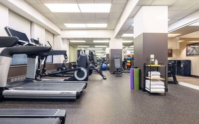 Fully equipped fitness center at The Benjamin Royal Sonesta New York.