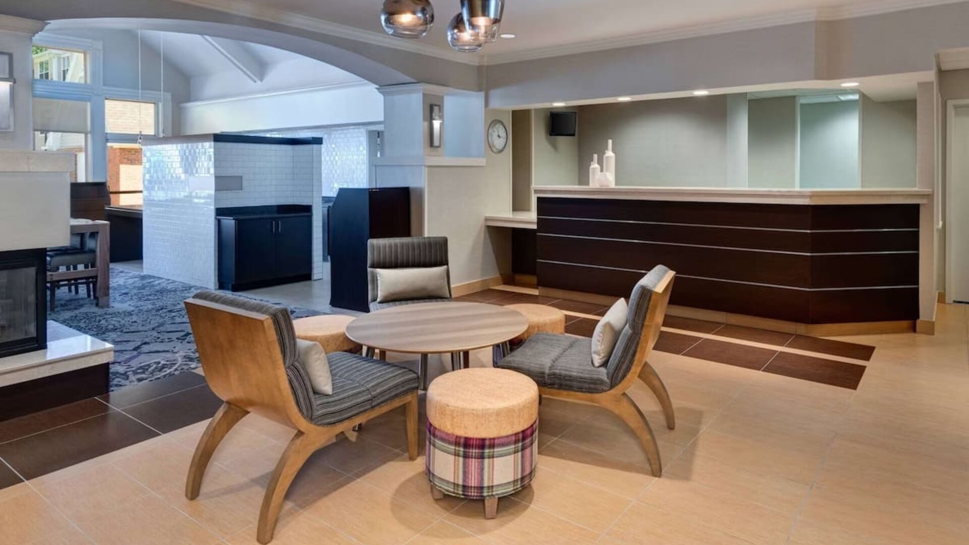 Reception and lounge area at Sonesta ES Suites Atlanta Alpharetta North Point Mall.