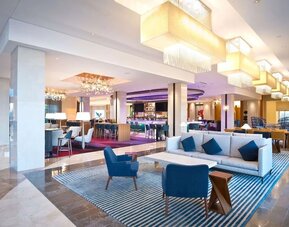 Lobby and coworking lounge at Hilton Orlando.