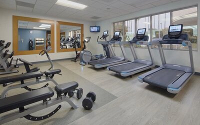 Fitness center at Embassy Suites By Hilton San Diego-La Jolla.