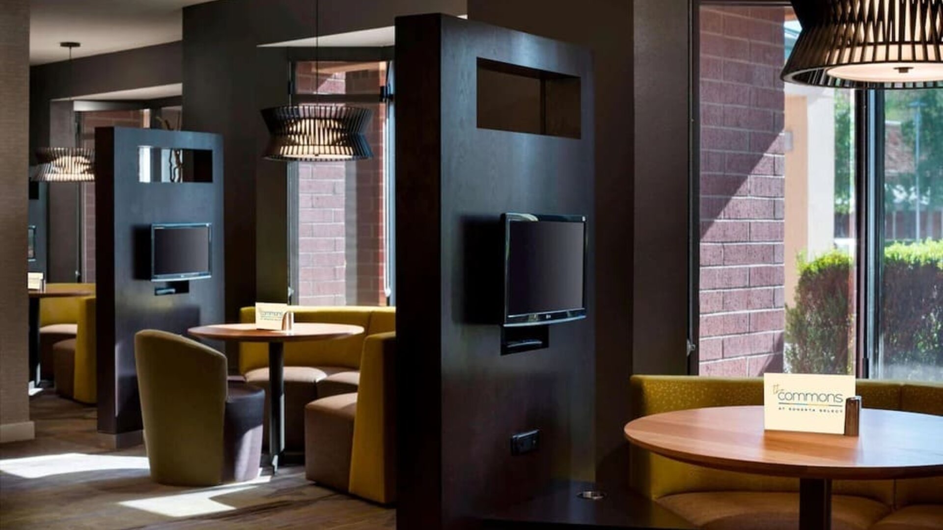 Dining area and coffee shop with comfortable seating perfect for coworking at Sonesta Select Tempe Downtown.