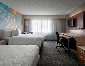 Bright and spacious day use twin room with work desk at Sonesta Select Tempe Downtown.