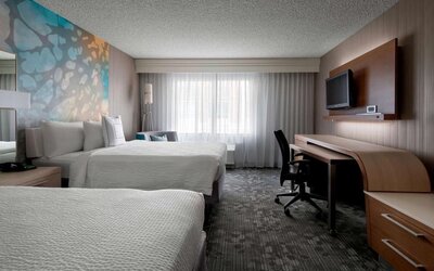 Bright and spacious day use twin room with work desk at Sonesta Select Tempe Downtown.
