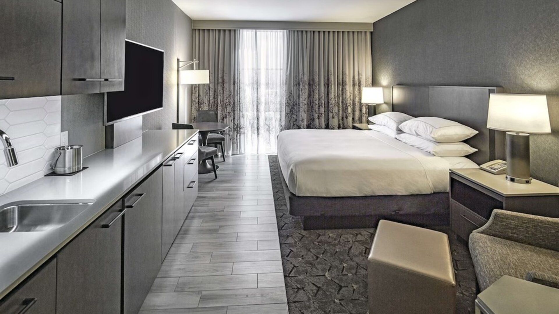 Day use room with mini kitchen and TV at DoubleTree By Hilton Modesto.