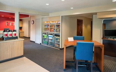 Lobby' coffee service and workspace at Sonesta Simply Suites Seattle Renton.