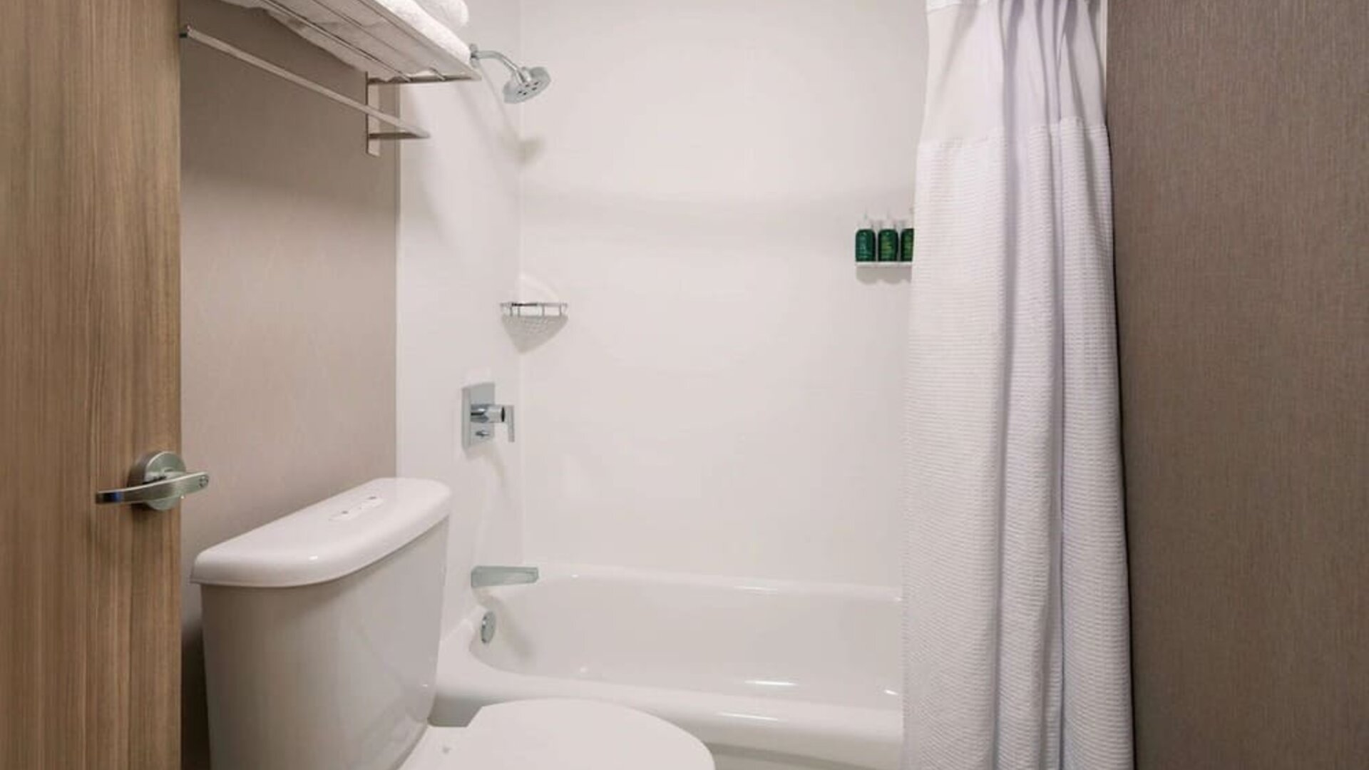 Private guest bathroom with shower at Sonesta Select Seattle Renton.