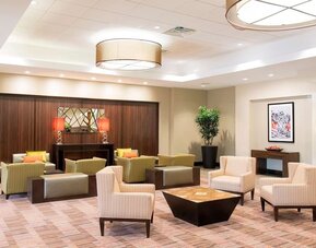Lobby and coworking lounge at DoubleTree By Hilton Grand Rapids Airport.