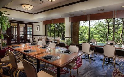 Dining area with a beautiful view perfect for coworking at DoubleTree By Hilton Lisle-Naperville.