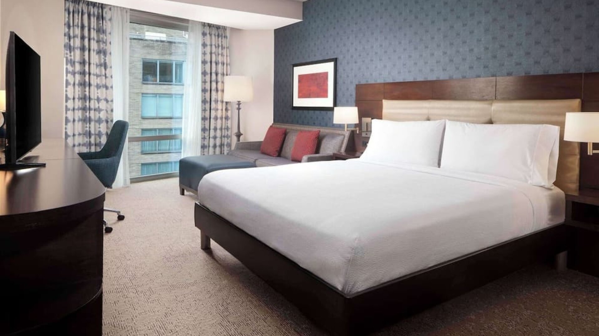 Day use room with work desk and sofa at Hilton Garden Inn Washington DC/Georgetown Area.