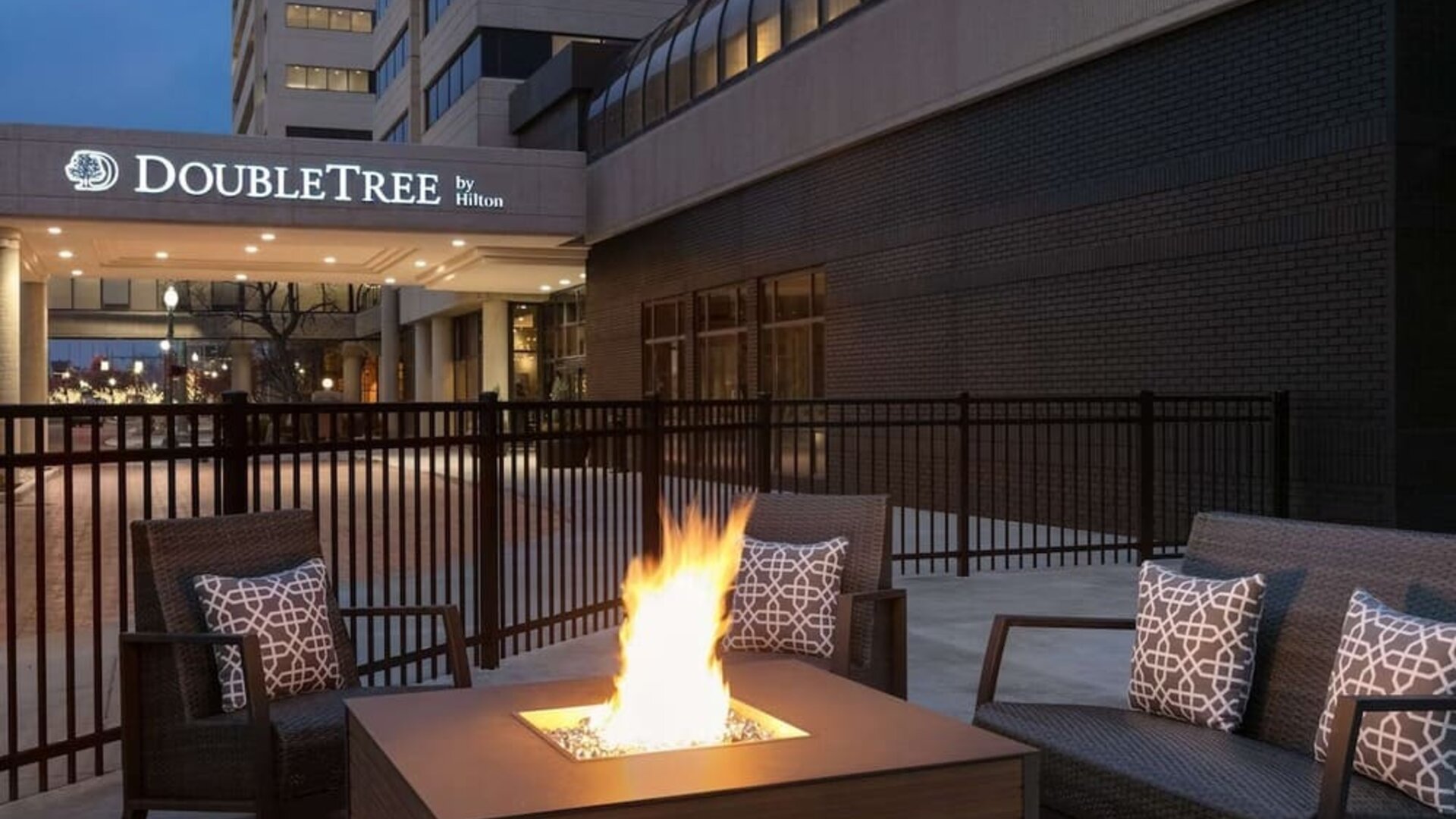 Firepit surrounded by seats at DoubleTree By Hilton Canton Downtown.