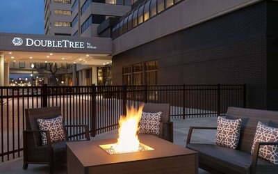 Firepit surrounded by seats at DoubleTree By Hilton Canton Downtown.