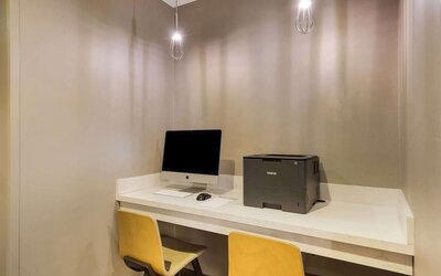 Business center with computer, printer and ergonomic chair at Sonesta ES Suites Parsippany Morris Plains.