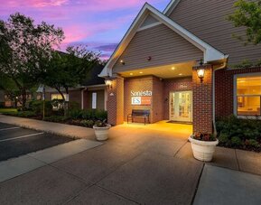 Hotel exterior and parking area at Sonesta ES Suites Parsippany Morris Plains.