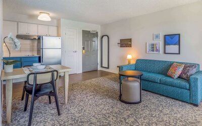 Day use suite with living room and kitchen at Sonesta ES Suites Austin The Domain Area.