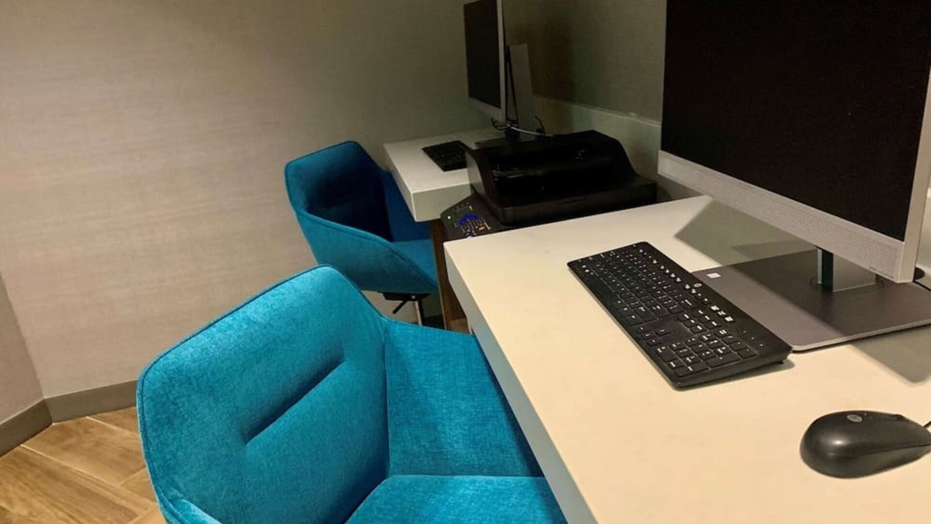 Business center with computers, printer and ergonomic chairs at Sonesta Columbus Downtown.