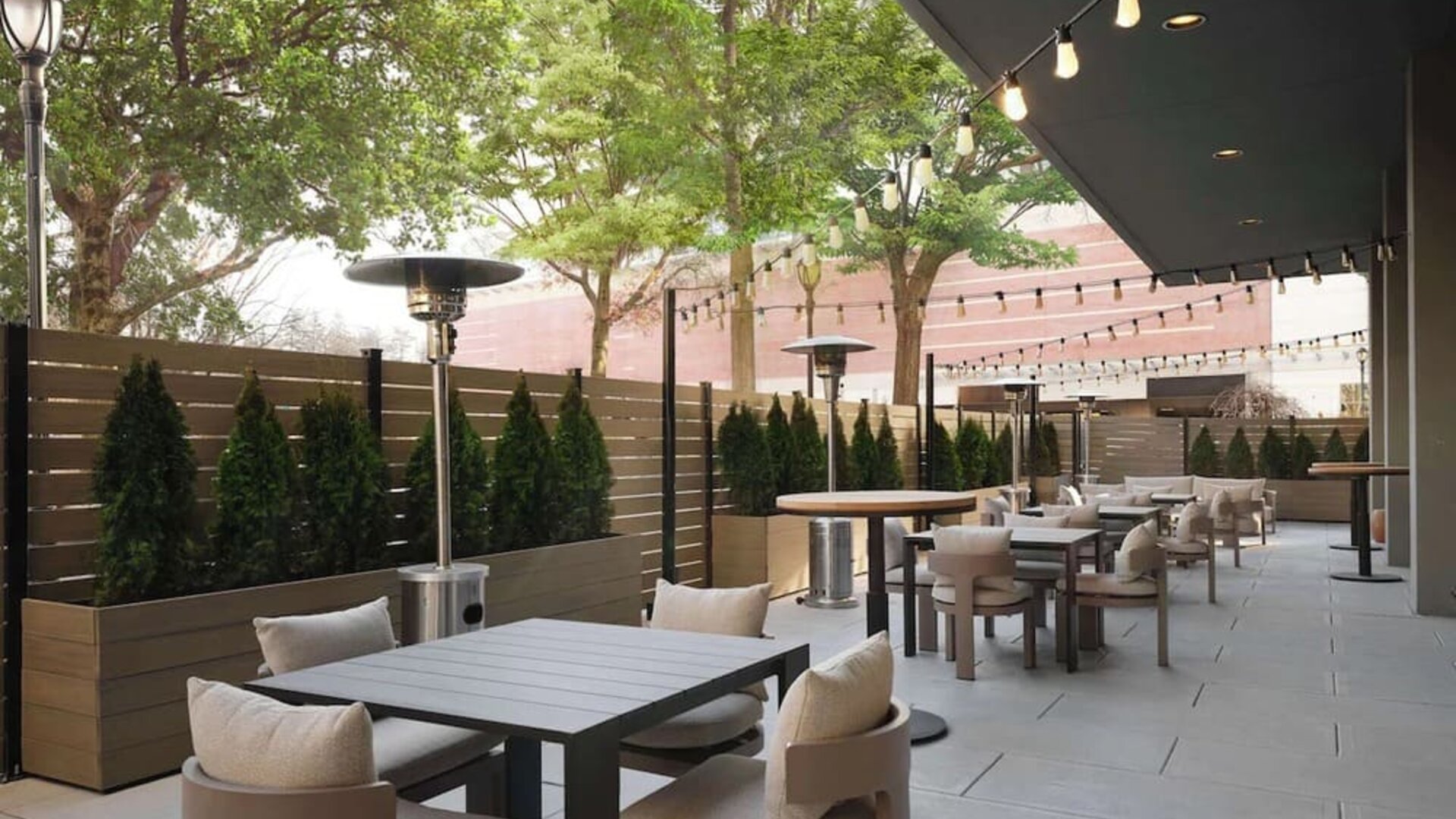 Hotel terrace with seating area, perfect for coworking at Sonesta White Plains Downtown.