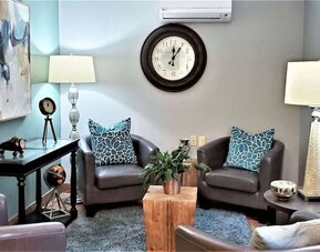 Comfortable lobby lounge at Sonesta Simply Suites Parsippany Morris Plains.