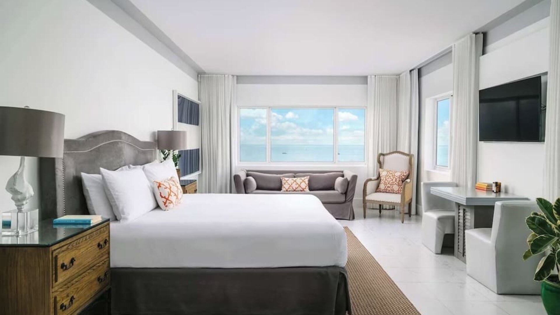 Bright and spacious day use room with workspace and lounge seating at Nautilus Sonesta Miami Beach.