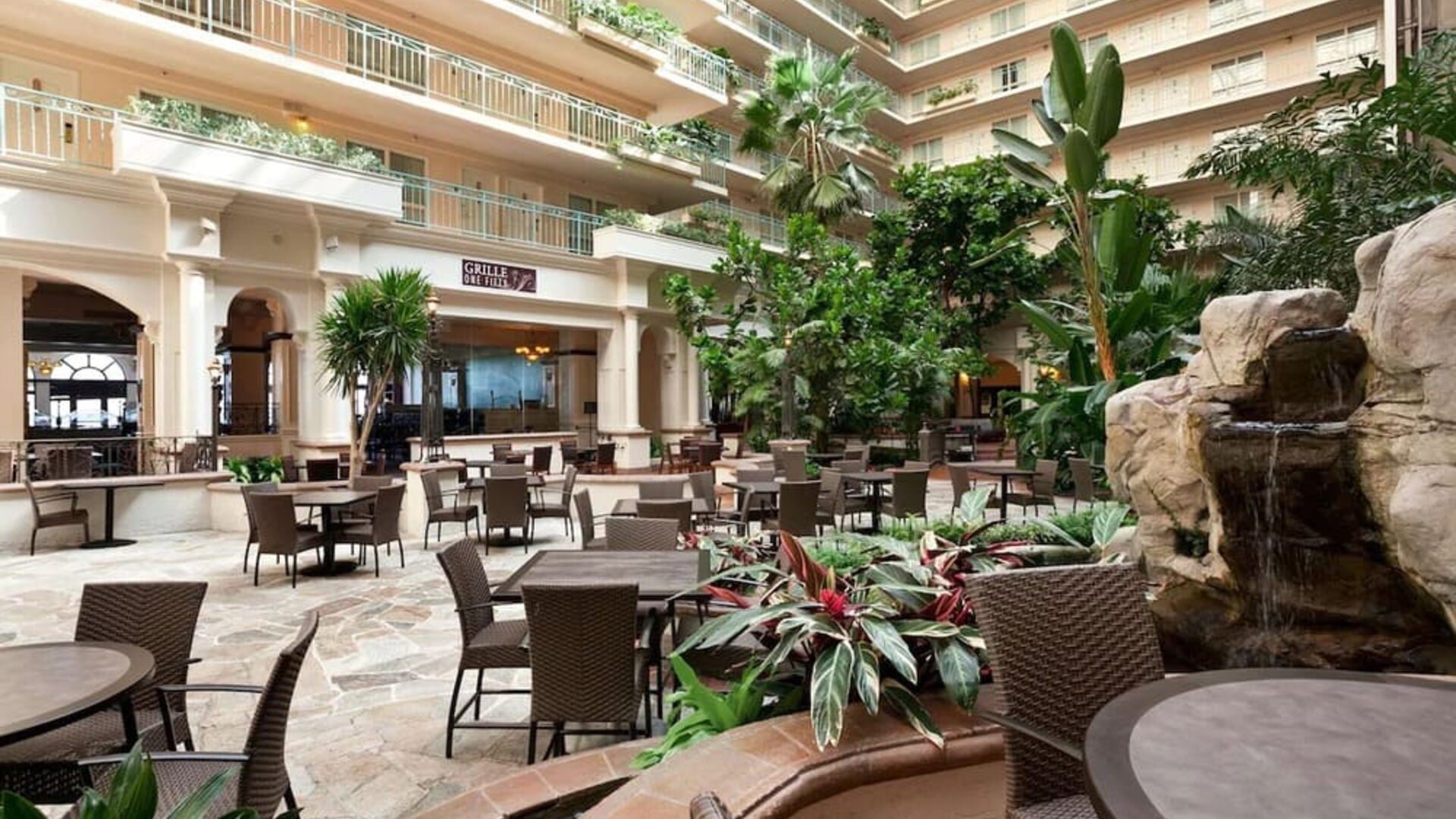 Breakfast area with natural light perfect for coworking at Embassy Suites By Hilton San Francisco Airport Waterfront.