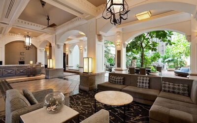 Lobby and coworking lounge at Embassy Suites By Hilton San Francisco Airport Waterfront.