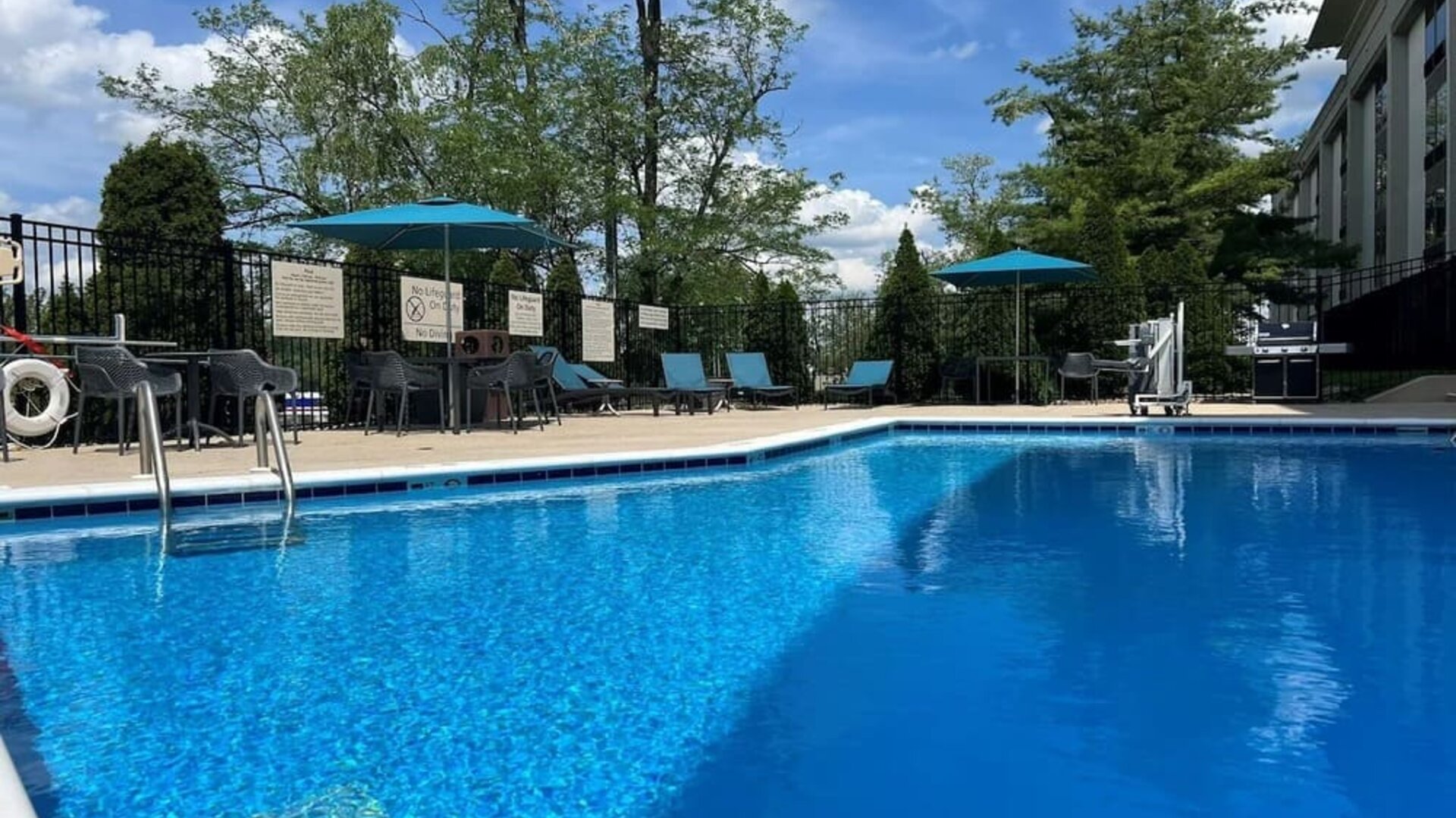 Refreshing outdoor pool at Hampton Inn Bloomington.