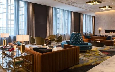Comfortable and stylish lobby lounge with fireplace at The Allegro Royal Sonesta Hotel Chicago Loop.