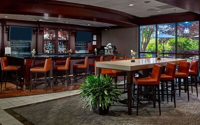 Hotel bar and lounge area at Sonesta Atlanta Airport North.