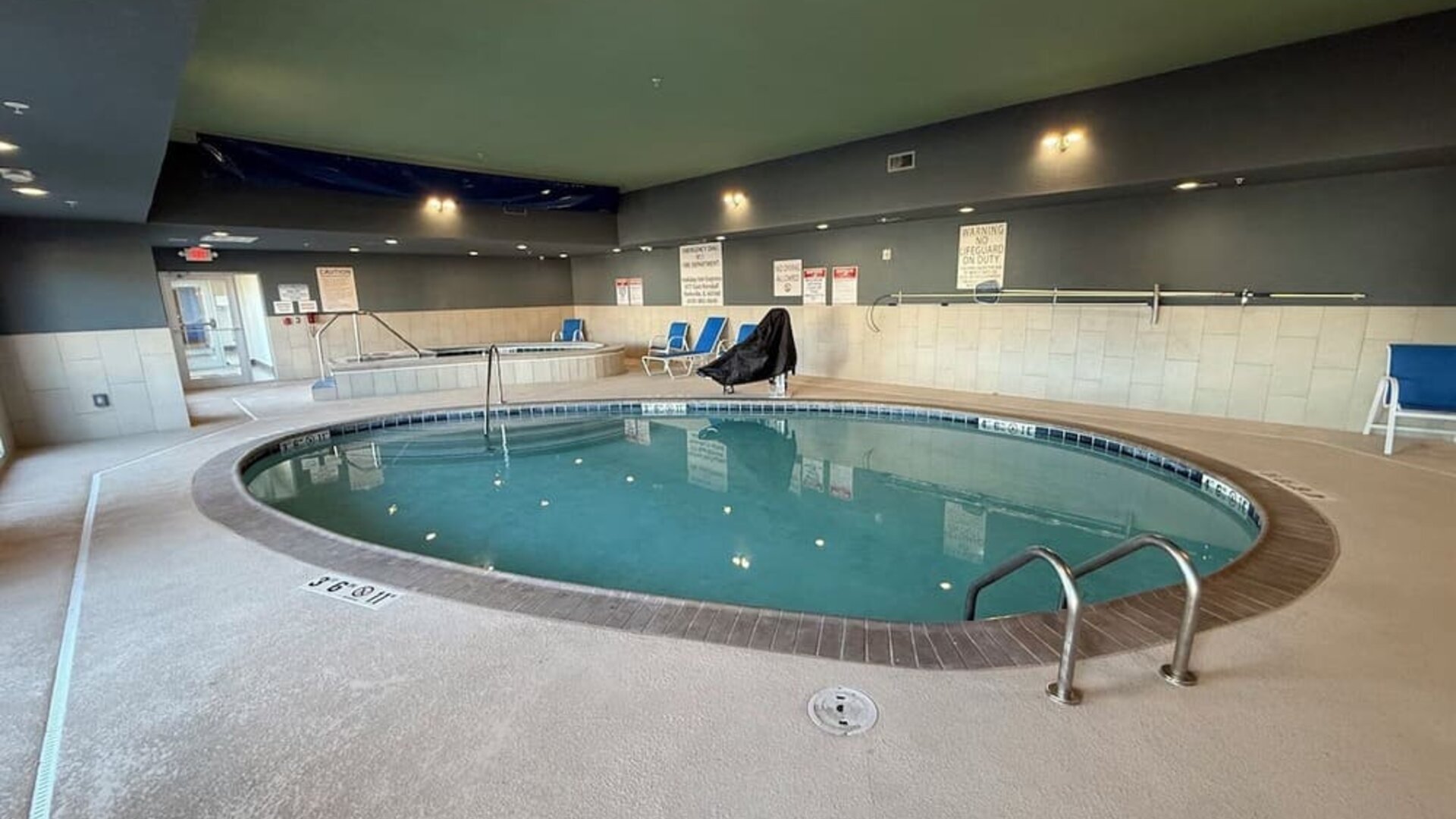Indoor pool and hot tub at Holiday Inn Express & Suites Yorkville.