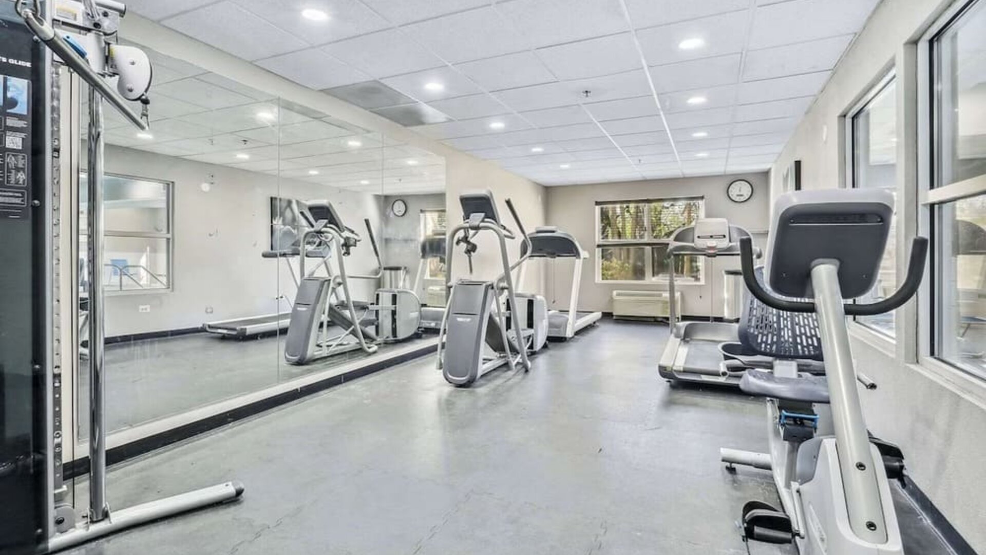 Well equipped fitness center at Country Inn & Suites By Radisson, Chicago O'Hare South.