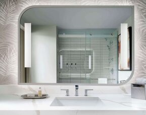 Private guest bathroom with shower at Sonesta Los Angeles Airport LAX.