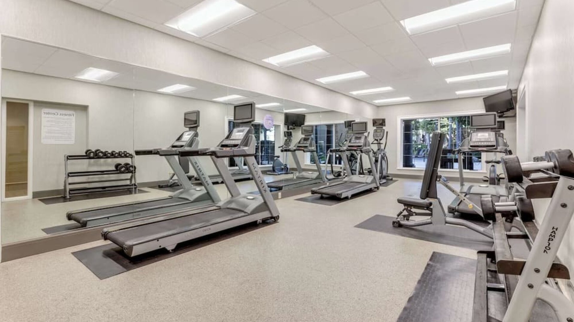 Fully equipped fitness center at Sonesta Anaheim Resort Area. 