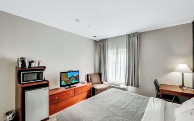 King room with TV at Quality Inn & Suites Liberty Lake - Spokane Valley.