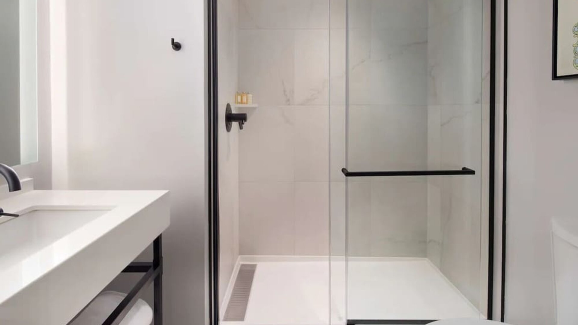 Private guest bathroom with shower at The Clift Royal Sonesta.