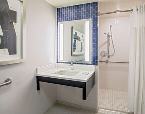 Private guest bathroom with shower at Royal Sonesta Boston.