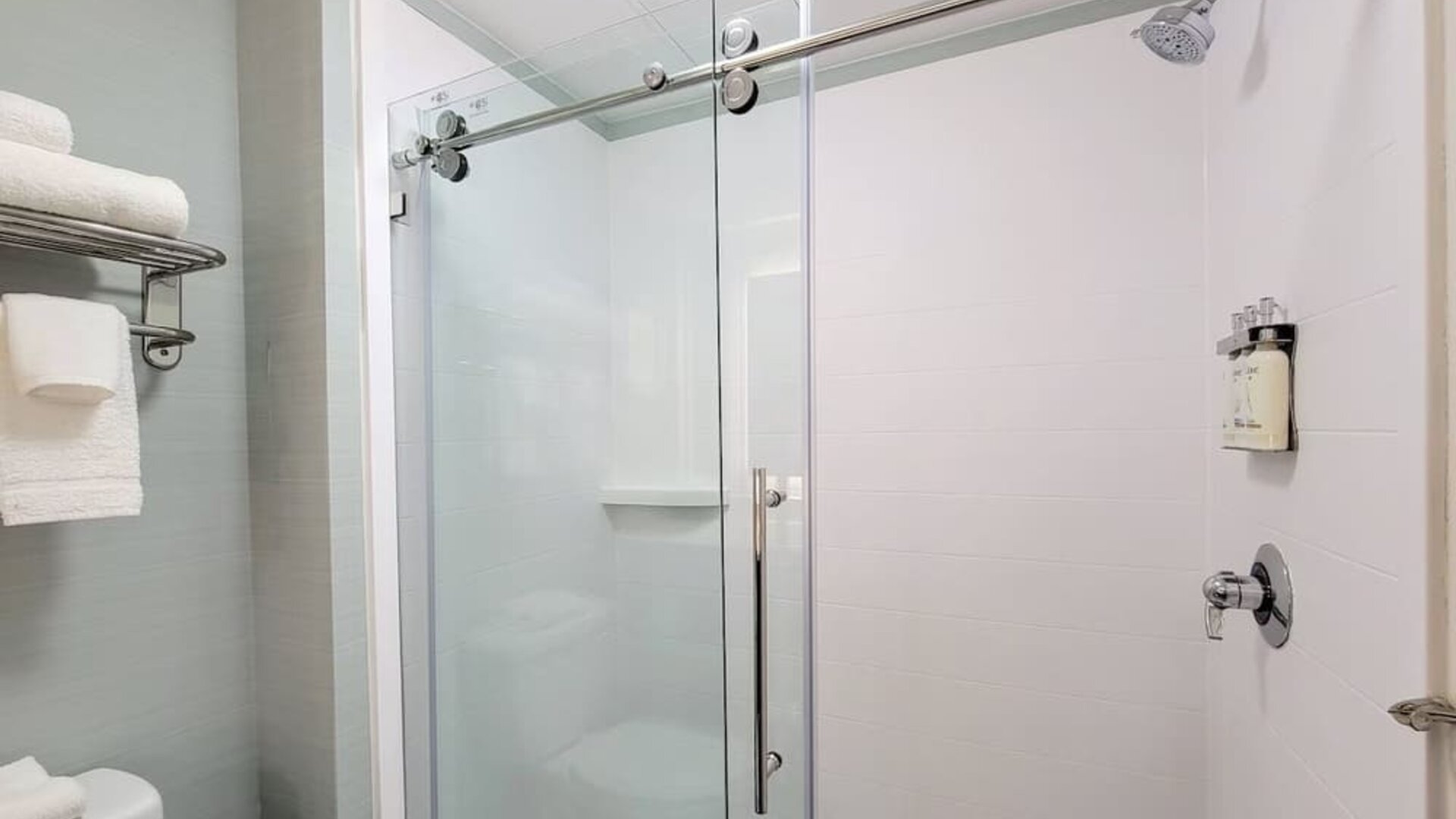 Private guest bathroom with shower and free toiletries at Holiday Inn Belcamp - Aberdeen Area.