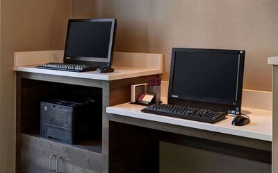 Business center with computers and printer at Sonesta ES Suites Chicago Downtown Magnificent Mile - Medical.