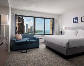 Bright and spacious day use room with sofa and private bathroom at Sonesta ES Suites Chicago Downtown Magnificent Mile - Medical.