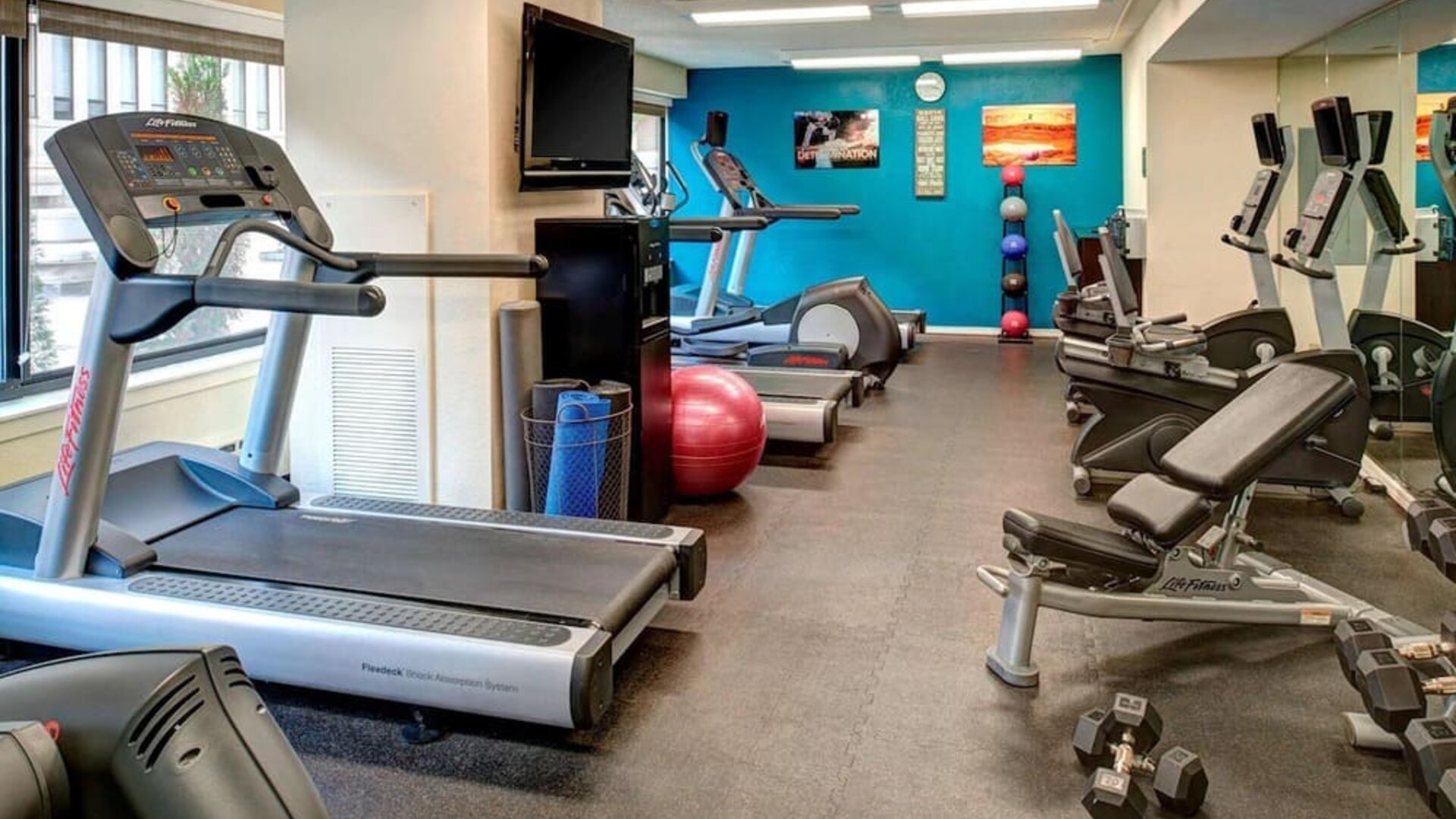 Fully equipped fitness center at Sonesta ES Suites Chicago Downtown Magnificent Mile - Medical.