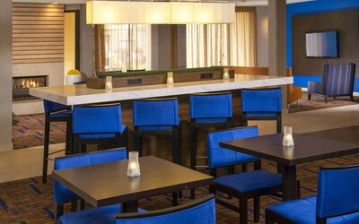 Dining area and workspace, perfect for coworking at Sonesta Select Charlotte University Research Park.