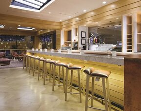 Hotel bar at DoubleTree By Hilton Tulsa-Downtown.

