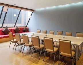 Professional meeting room with natural light at Hilton San Francisco Financial District.