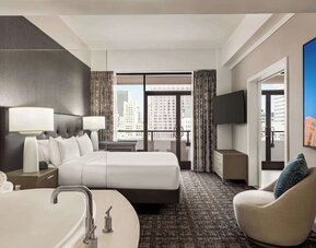 Day use room with tub and balcony at Hilton San Francisco Financial District.