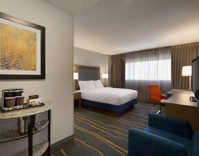 Day use room with work desk, lounger and coffee machine at DoubleTree By Hilton Albuquerque.