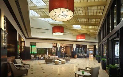 Lobby and coworking lounge at Hilton Rosemont/Chicago O'Hare.