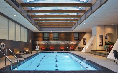 Bright-lit indoor pool at Palmer House A Hilton Hotel.